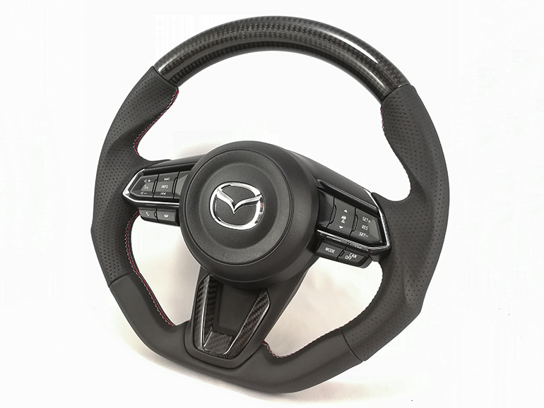 KF系CX-5、BM系アクセラ後期、平成28年11月以降のCX-3およびDJ系デミオに装着可能なケンスタイルのカーボン/レザーコンビステアリング KF系CX-5、BM系アクセラ後期、平成28年11月以降のCX-3およびDJ系デミオに装着可能なケンスタイルのカーボン/レザーコンビステアリング
